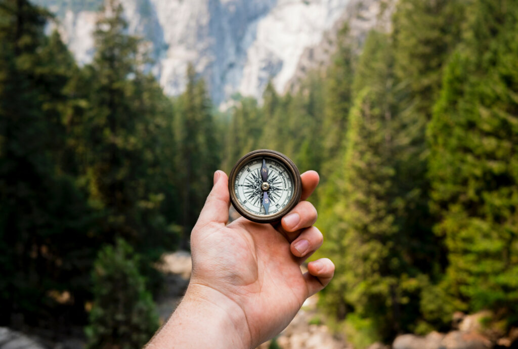 Person holding compass